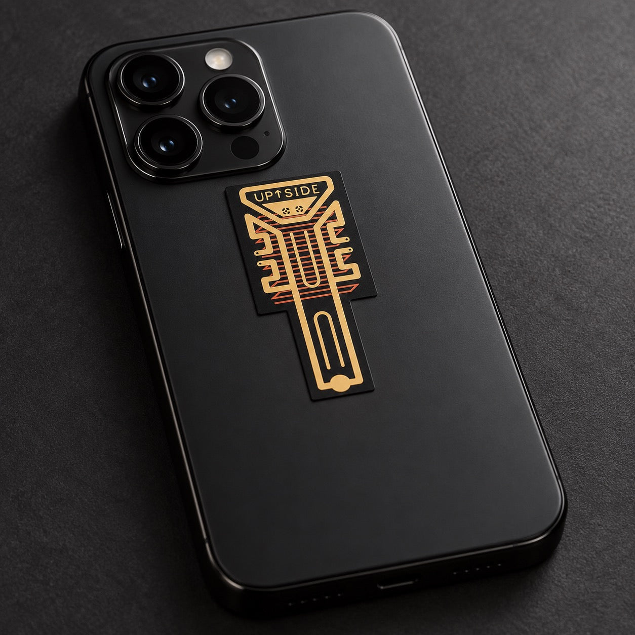 Angled view of the signal booster attachment on a phone